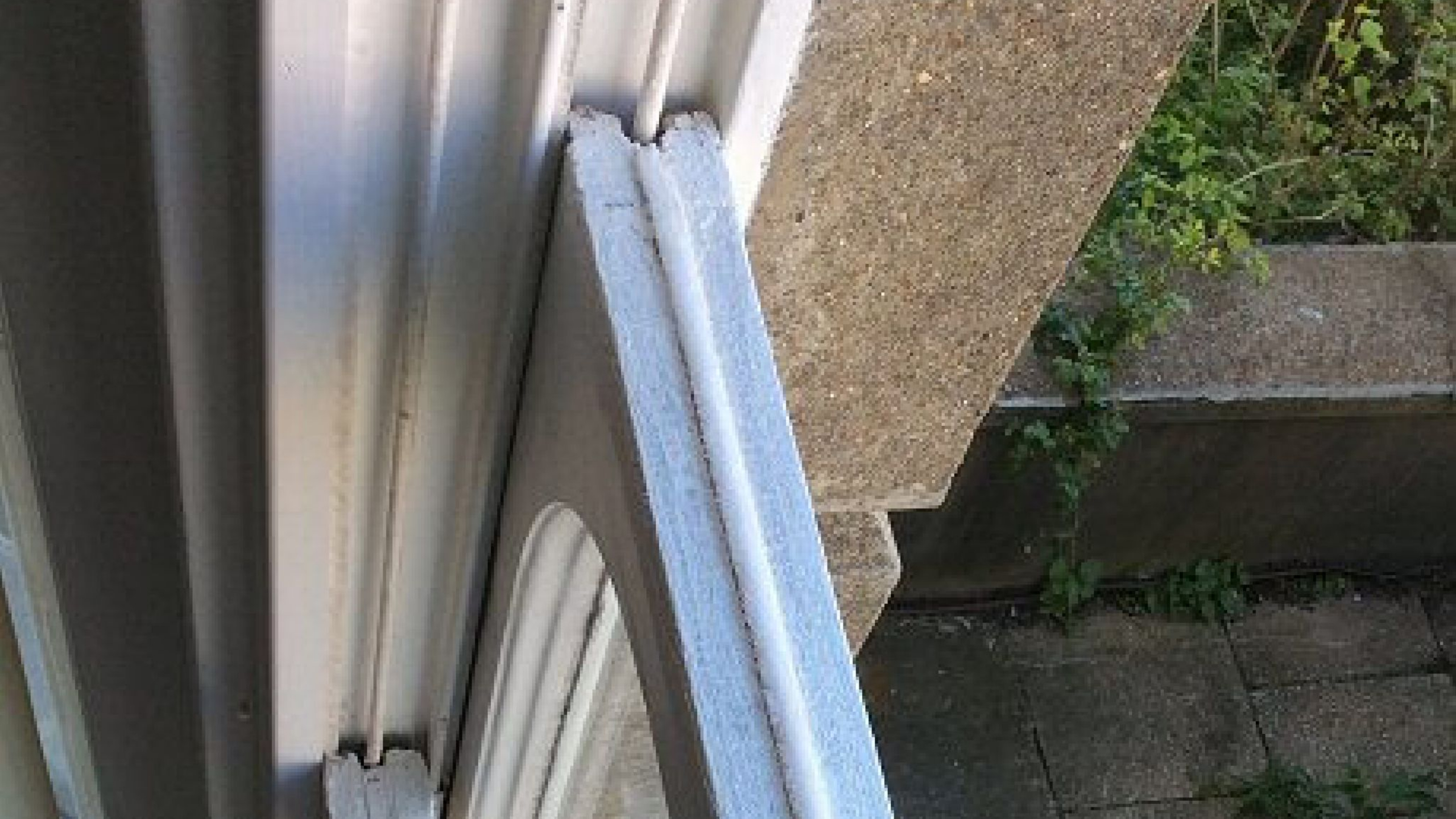 Brush seal draught proofing fitted to a wooden sash window in Bristol